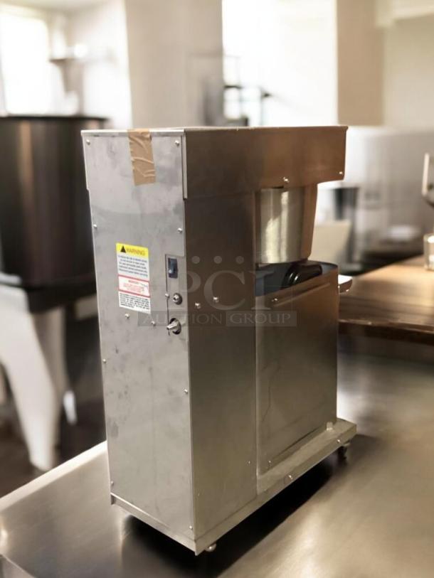 Commercial cold brew dispenser in great condition, fully tested. Stainless steel exterior with warning label visible.