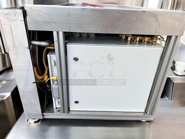 Apace UM1EGA ventless hood system in outstanding condition, 208V, fully tested and working, with visible wiring and components.