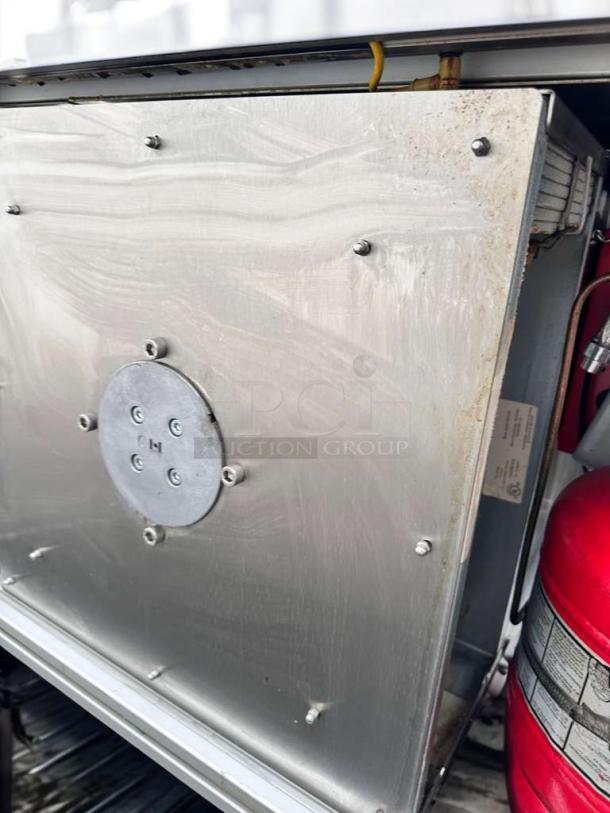 Apace UM1EGA ventless hood system in outstanding condition, 208V, stainless steel, with visible wiring and fire safety equipment.