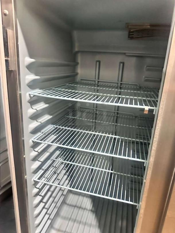 Delfield 6000XL commercial freezer, prime condition, four adjustable shelves, reach-in design, fully tested and working.