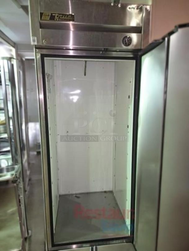True T-23F single door reach-in freezer, stainless steel, 115V, prime condition, fully tested and working, model tag visible.