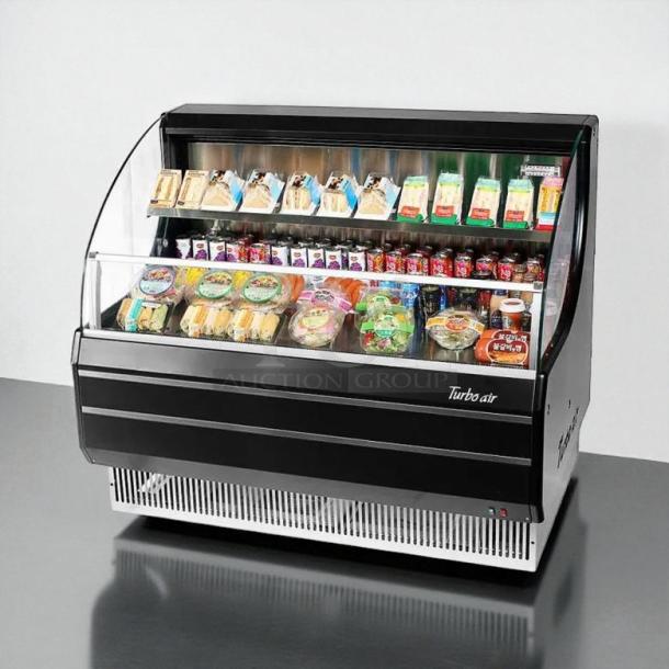 Turbo Air TOM-50LB-N 50" open air cooler, two levels, excellent condition, 115V, displaying assorted packaged food items.