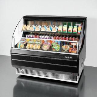 Turbo Air TOM-50LB-N 50" open air cooler, two levels, excellent condition, 115V, displaying assorted packaged food items.