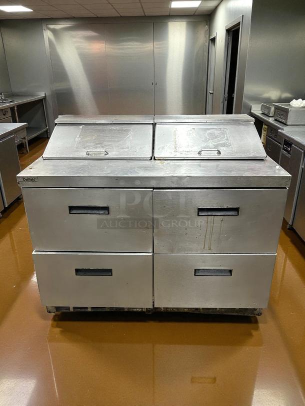 Delfield D4448NP-12 48" sandwich prep refrigerator, 12 pan top, 4 drawers, excellent condition, 115V, fully tested.