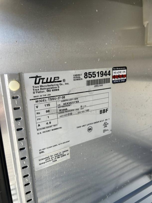 True TSSU-27-08 stainless steel sandwich/salad prep table, fully tested, 115V, serial number 8551944, made in USA.