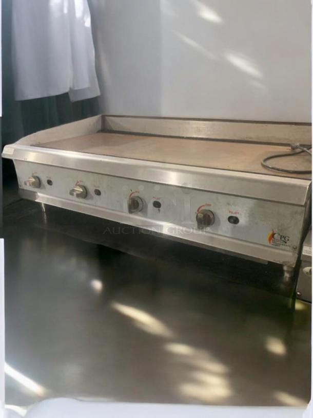 48" CPG Commercial Gas Griddle with refrigerated base, fully tested, excellent condition. Features control knobs and CPG branding.