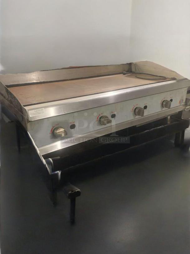CPG 48" commercial gas griddle with refrigerated base. Outstanding condition, four knobs, fully tested, working.