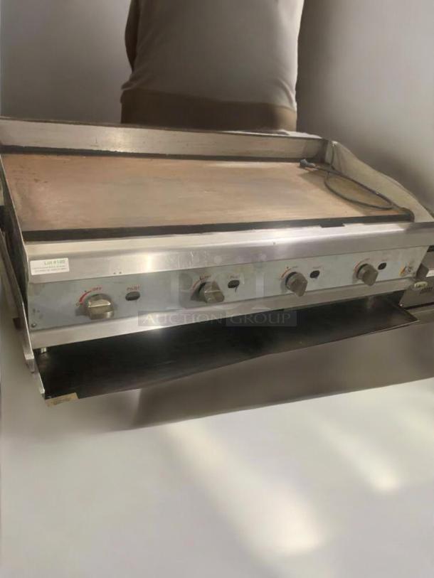 CPG 48" commercial gas griddle with refrigerated base, outstanding condition, fully tested and working, visible control knobs.