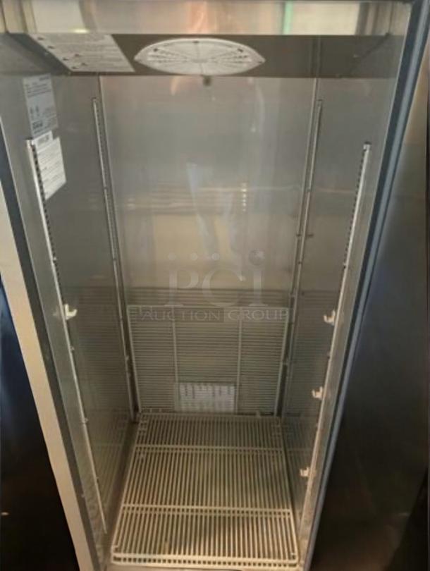 eLine Single Door Commercial Freezer, outstanding condition, natural refrigerant, fully tested, internal shelving, model info visible.