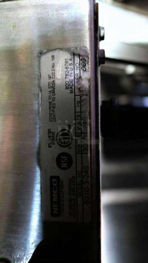 Alt Text: Nemco 6310-3-240 double solid burner electric hot plate label showing model, ETL, NSF certifications, and 240V rating.
