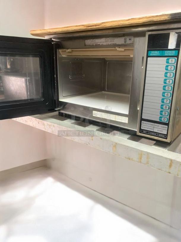 Amana RFS12MPSA commercial microwave, open door, keypad controls, exceptional condition, 120V, stainless interior.