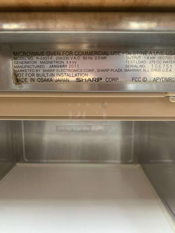 Amana RFS12MPSA commercial microwave oven in exceptional condition; 120V, fully tested, with clear model labeling.