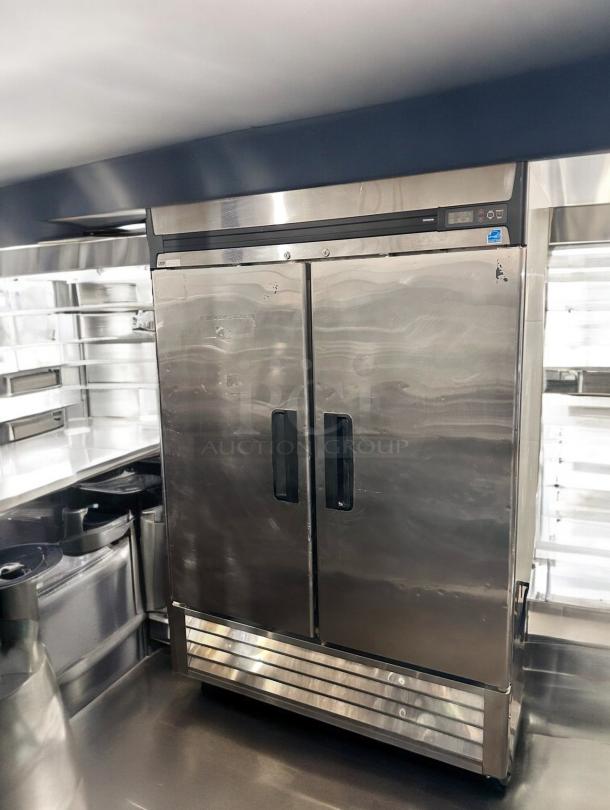 True R49-S commercial reach-in refrigerator in prime condition, 115V, stainless steel, fully tested and working, dual doors.