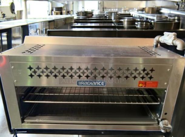 Radiance TACM-36 gas cheese melter in outstanding condition, 36-inch, fully tested. Star cutout design, Radiance logo visible.