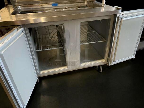 Turbo Air TSU-4RW-N6 refrigerated prep table, 36", stainless steel, open doors, shelves, excellent condition, tested.