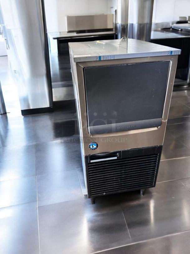 Hoshizaki KM-81BAJ undercounter ice maker, exceptional condition, 115V, fully tested, silver finish, front vent.