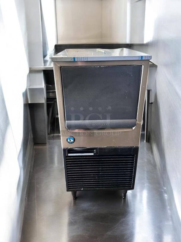 Hoshizaki KM-81BAJ undercounter crescent cube ice maker, 115V, exceptional condition, fully tested, stainless steel exterior.