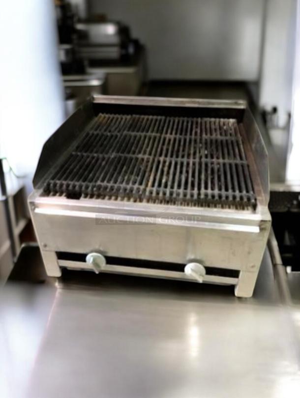 Standard 24-36" commercial gas charbroiler in outstanding condition, fully tested, with dual control knobs on stainless steel body.