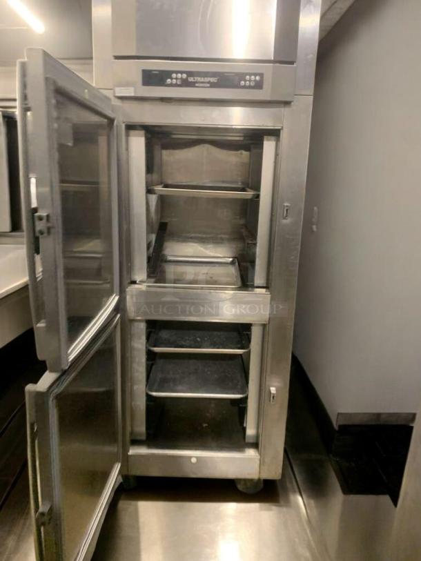 Prime condition Victory RFS-1D-S1-EWHD SPEC14 single door commercial reach-in freezer, 115V, open door, shelves visible.