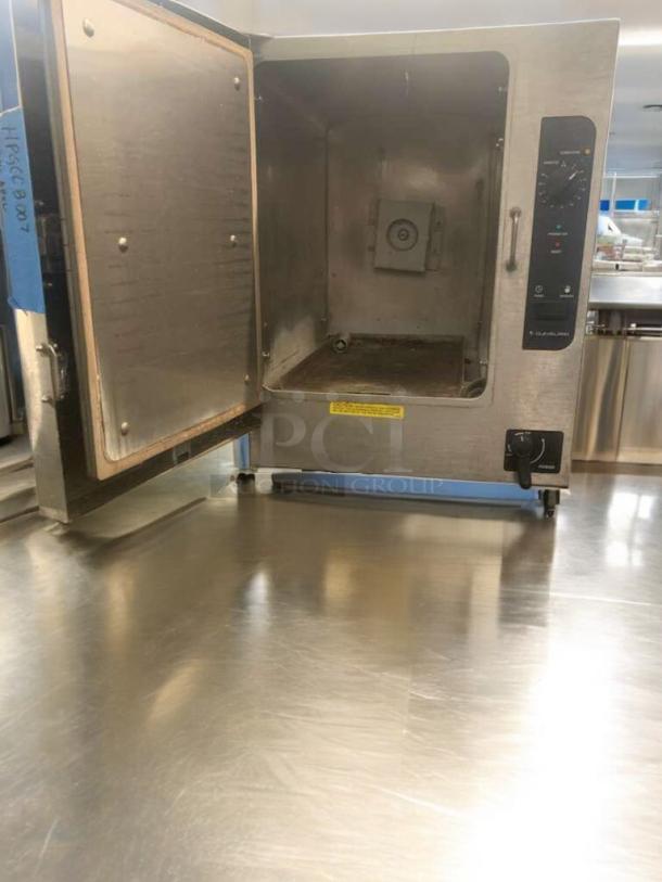 Cleveland 22CET6.1 electric countertop steamer, fully tested, stainless steel, open door, control panel visible, prime condition.