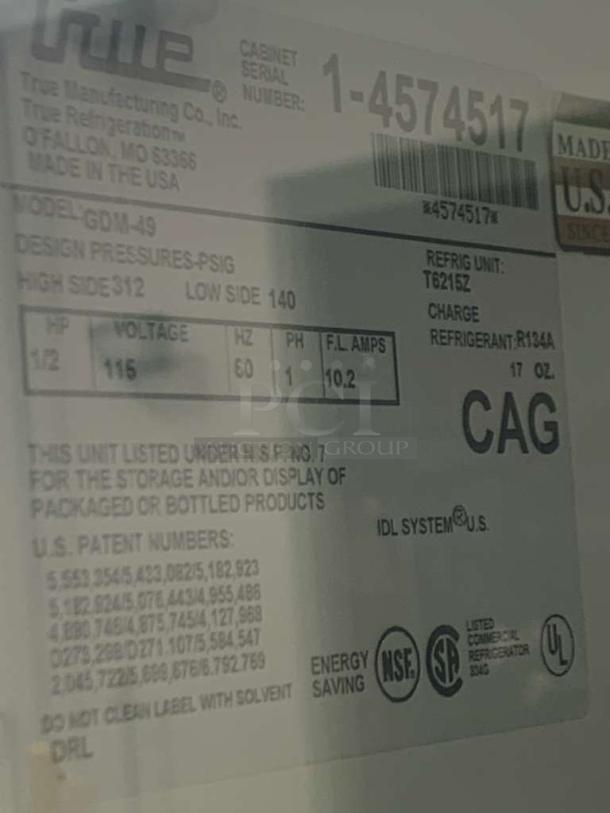 Label on True GDM-49 Glass Merchandiser Cooler. Serial 1-4574517, 115V, 10.2 F.L. Amps, NSF No. 7 certified, R134A refrigerant.