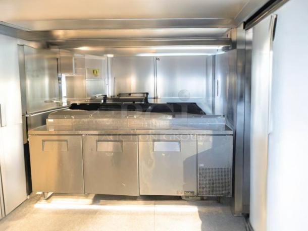 True TPP-93 pizza prep table in impressive condition, stainless steel, 115V, features multiple compartments, fully tested.