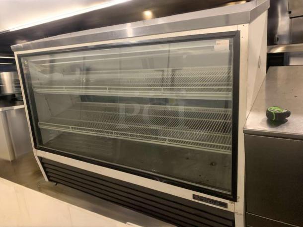 True GDM-71-SL-HC-TSL01 glass merchandiser cooler, 71 cu.ft, triple door, exceptional condition, fully tested and working.