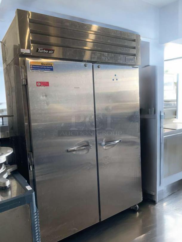 Turbo Air PRO-50F double door commercial freezer, stainless steel, 115V, prime condition, fully tested, visible quality labels.
