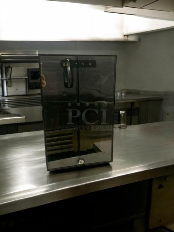 Prime condition MC-18 black mini cooler by Foshan Kesheng, fully tested, 220V, visible control panel, sleek design.