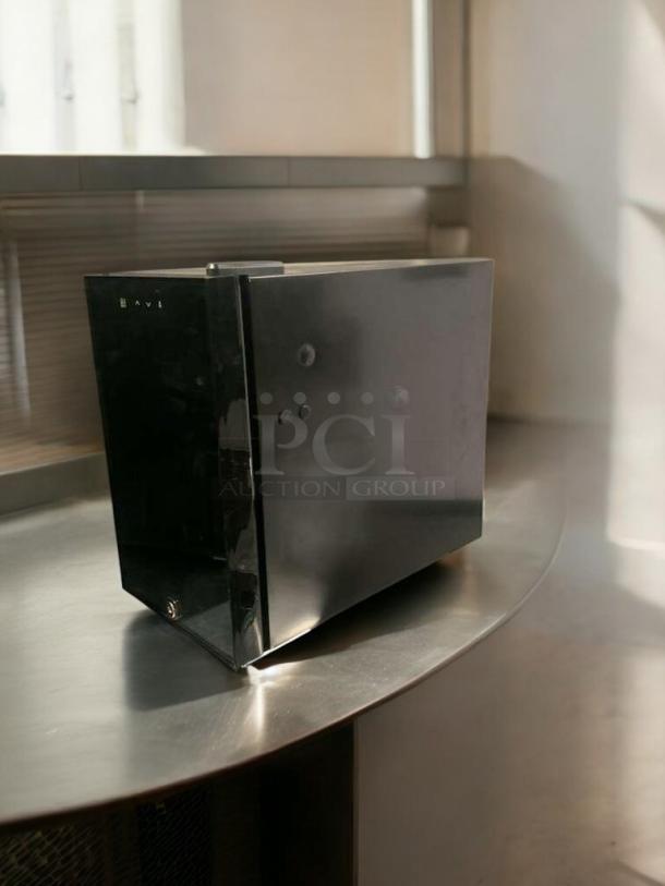 Prime condition MC-18 black mini cooler by Foshan Kesheng, 220V, compact design, fully tested and working.