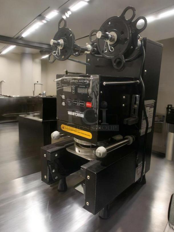 WANTJOIN WZ-95B automatic cup sealing machine, prime condition, 110–120V, tested and working. Includes control panel.