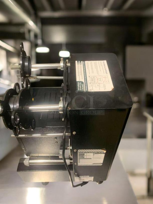 WANTJOIN WZ-95B Automatic Cup Sealing Machine in prime condition, 110-120V, fully tested and working with visible labels.