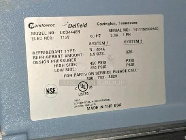 Manitowoc Delfield UCD4448N label showing specs: 115V, 60HZ, refrigerant R-404A, NSF and UL listed, made in USA.