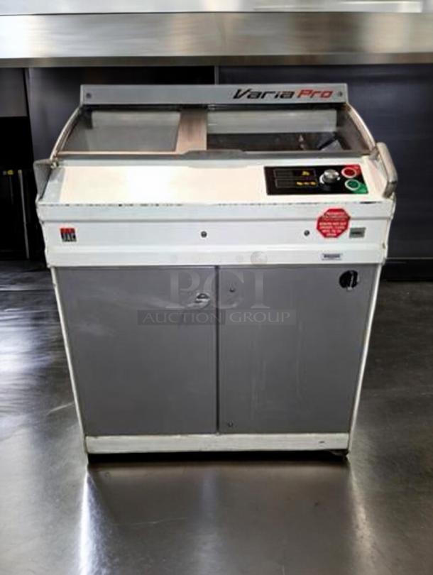 JAC Varia Pro MPL800 bread slicer in excellent condition, fully tested. Features control panel and safety shield, JAC logo visible.