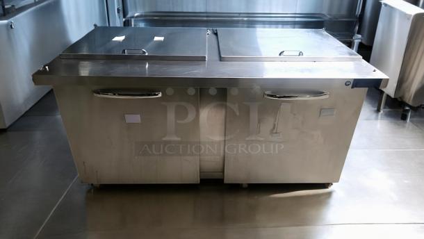 Avantco SS-PPT-60 refrigerated pizza prep table, dual lids, prime condition, fully tested, stainless steel exterior.