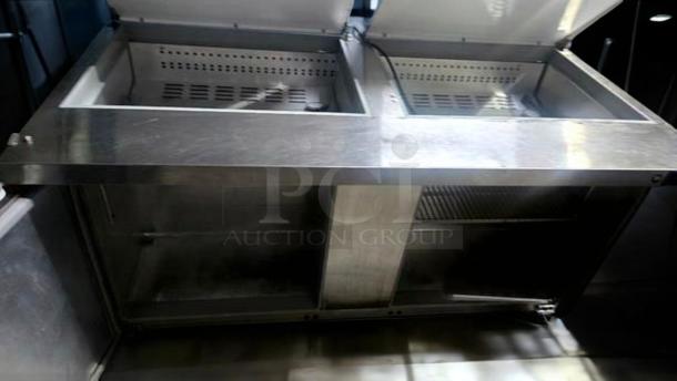 Avantco SS-PPT-60 refrigerated pizza prep table with dual lid, prime condition, fully tested, shown open.