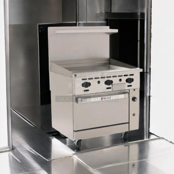 Wolf Range Company Model 634-923, 36" natural gas griddle with standard oven; prime condition; fully tested and working.