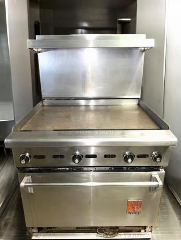 Wolf Range Model 634-923, 36" gas griddle with oven, prime condition, fully tested, stainless steel, visible brand logo.