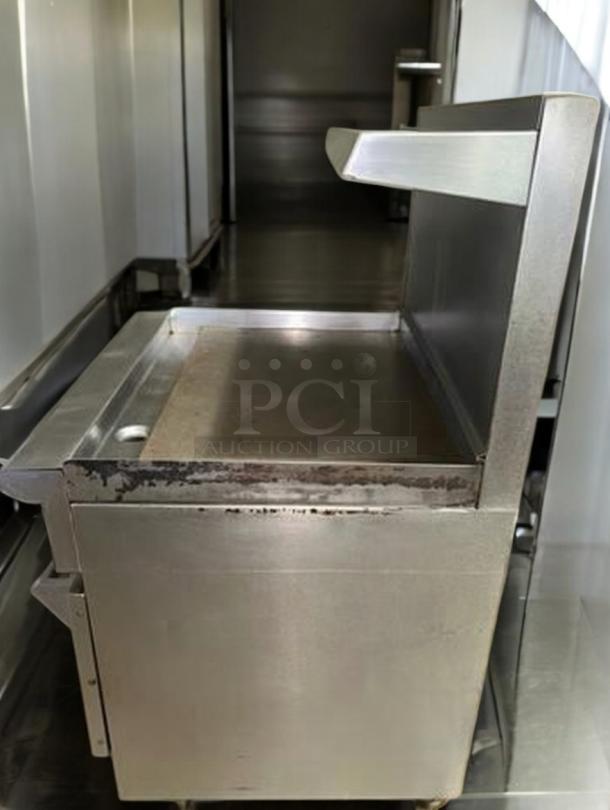 Wolf Range Model 634-923, 36" natural gas griddle with oven. Stainless steel. Prime condition, fully tested.