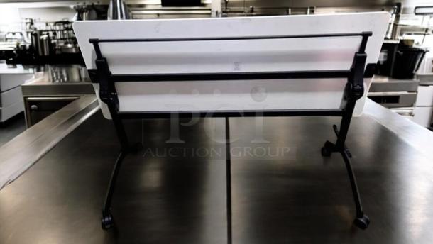 Flip-top training/conference table in prime condition, black locking casters, adjustable frame, fully functional.