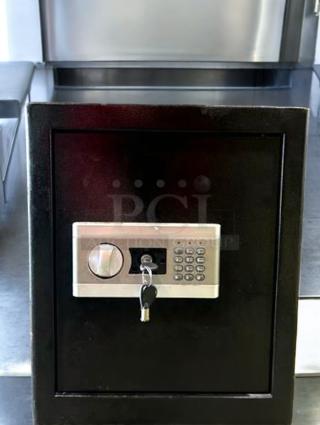 Heavy-duty digital safe, commercial grade, dual-lock system, prime condition, fully tested, black with keypad and key lock.