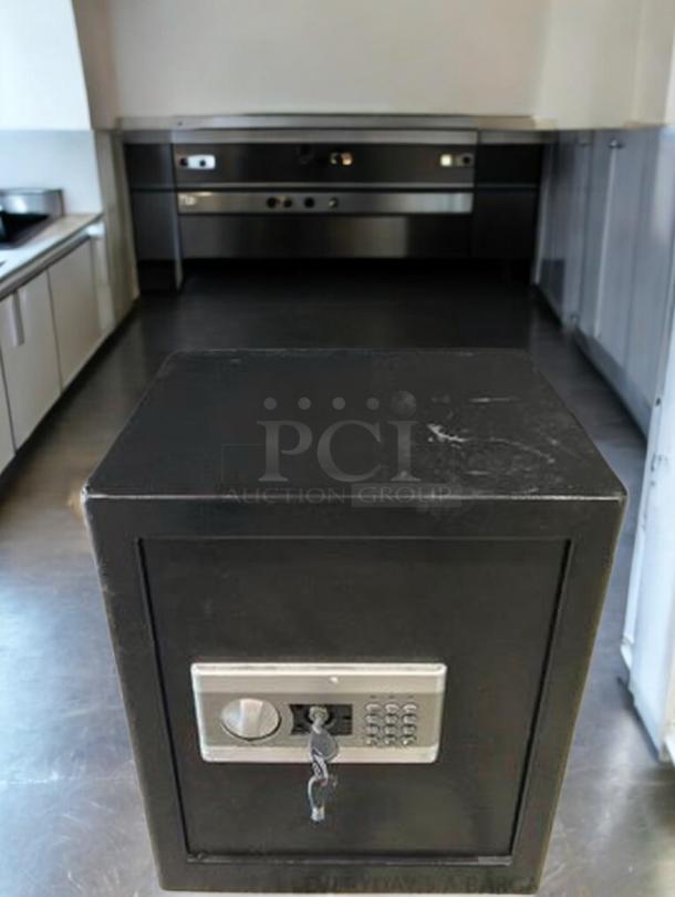 Commercial grade heavy-duty digital safe, prime condition, dual-lock system, fully tested, black finish.