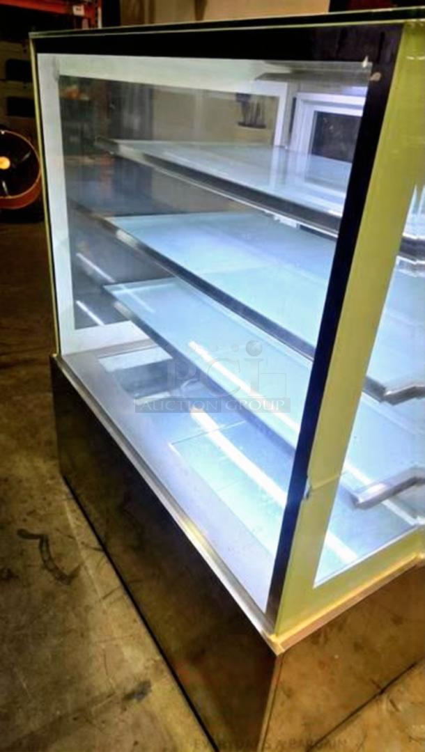 Commercial bakery enclosed display case, glass shelves, stainless steel base, remarkable condition, fully tested and working.