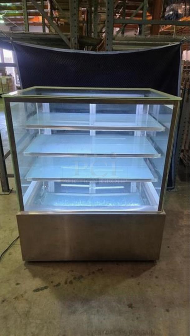 Commercial bakery enclosed display case, fully tested, remarkable condition, glass shelves, stainless steel base.