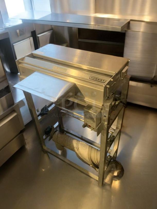 Immaculate Hobart W32-6 dough sheeter, 120V, fully tested, solid metal design, brand label visible, excellent condition.