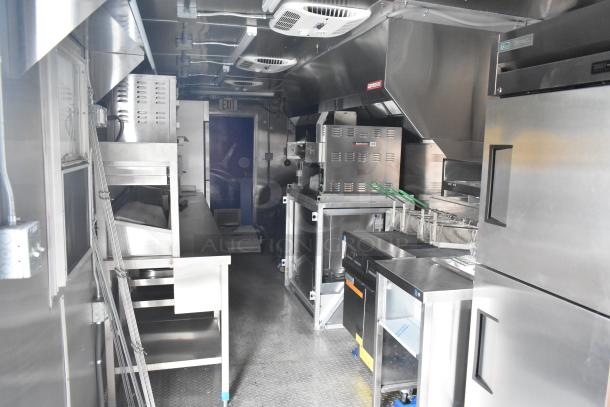 Brand new 2021 Cruising Kitchens 24' Burger King trailer, equipped with commercial-grade appliances, including CaptiveAire hood, Nieco broiler, Frymaster fryer, and True coolers.