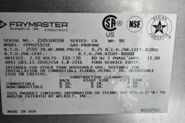 Label on Frymaster equipment showing model FPPH255CSE, gas-propane specs, and construction clearances. Made in USA.