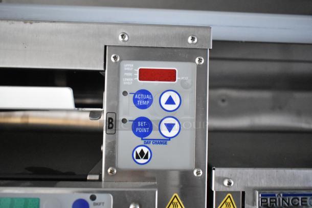 Control panel of the Cruising Kitchens 2021 Fast Food Trailer, featuring temperature and shelf settings.