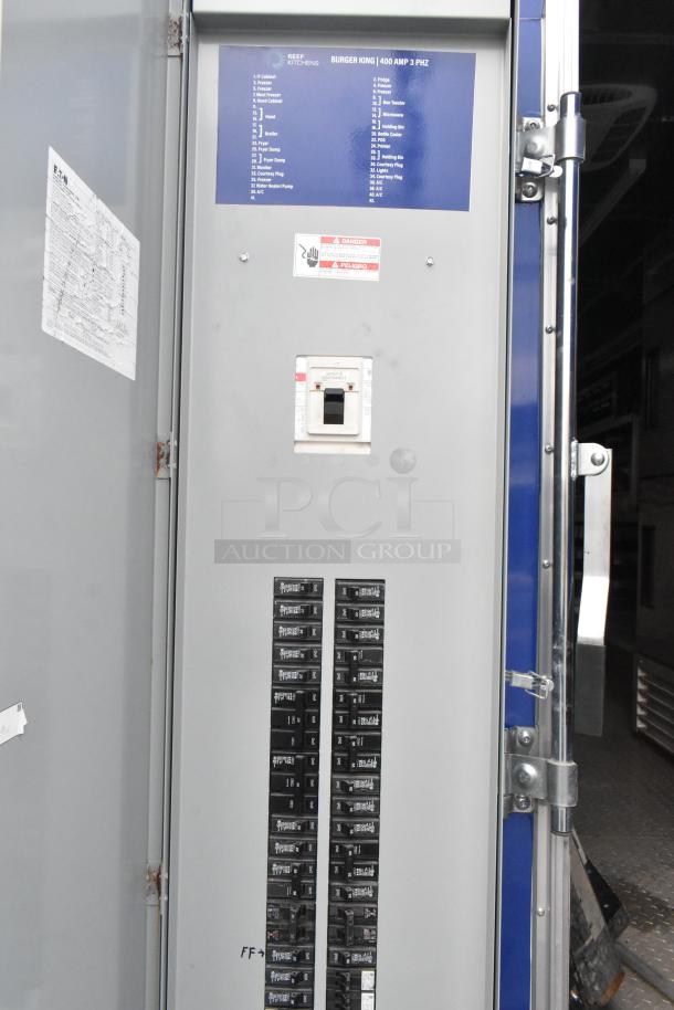 Electrical panel of a 2021 Cruising Kitchens 24' Burger King mobile kitchen trailer, labeled circuits, 400 AMP 3 PHZ.