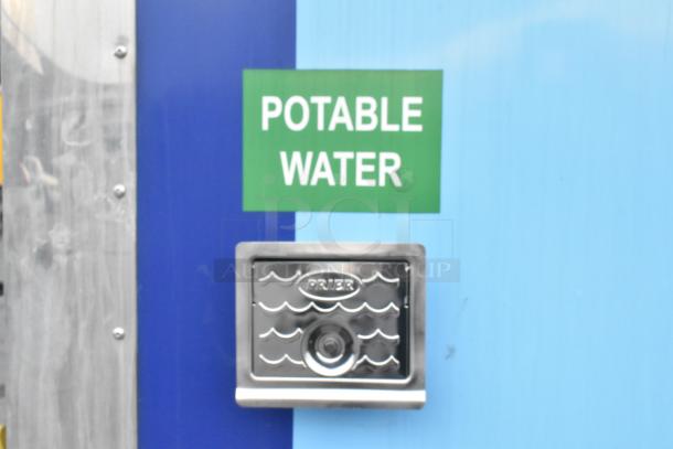 Potable water access on 2021 Cruising Kitchens food trailer, featuring Priefert valve, labeled for safe drinking water.